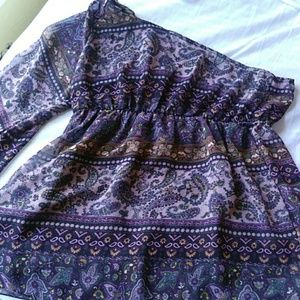 A beautiful one sleeve blouse